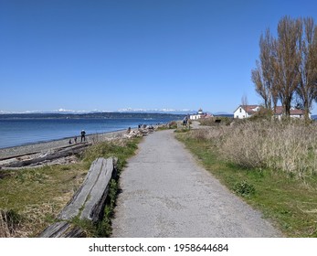 Seattle, WA USA - circa April 2021: Gorgeous view of the Olympic Mountain range on a cloudless day at Discovery Park.