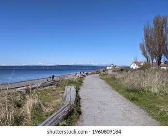 Seattle, WA USA - circa April 2021: Gorgeous view of the Olympic Mountain range on a cloudless day at Discovery Park.