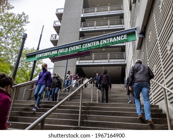 Seattle, WA USA - Circa May 2021: People Arriving For And Leaving After Receiving The Covid 19 Vaccine At Lumen Field.