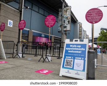 Seattle, WA USA - Circa May 2021: View Of People Waiting In Line For Security Checks Before Receiving The Covid 19 Vaccine At Lumen Field