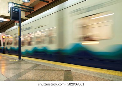 Seattle, WA, USA Feb 17, 2017: Motion Blur Of Sound Transit Link Light Rail Train Entering Station In Seattle Transit Tunnel