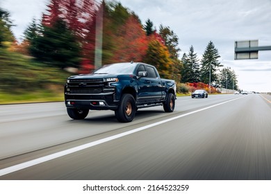 Seattle, WA, USA
Feb 2, 2022
Ford Shelby GT 350 and Chevy Z71 driving on the highway with trees on the left side