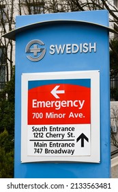 Seattle WA, USA - March 06, 2022; Pedestal Sign With Directions And Logo For Swedish Medical Center In Seattle