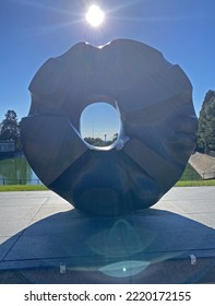 SEATTLE, WA, USA - SEP, 08, 2022: Black Hole Sun Sculpture By Noguchi At Volunteer Park In Seattle.