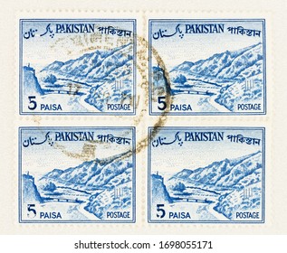 SEATTLE WASHINGTON - April 5, 2020: Close up of 4 joined blue Pakistan stamps of 1961 featuring the Khyber Pass.  Scott # 132.