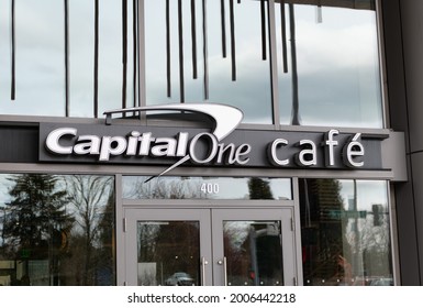 Seattle, Washington D.C. USA - April 02, 2021: Capital One Cafe Brand Logo Sign At Entrance