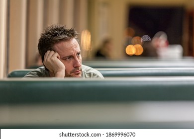 Seattle, Washington - May 08, 2009: Man Rests His Head On His Hand While On Public Transportation. 