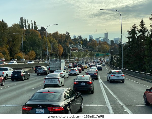 Seattle, Washington: October 27, 2019: Cars\
driving to the city center of Seattle, Washington. Seattle has a\
population of 724,745\
people.