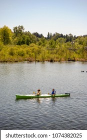 SEATTLE, WASHINGTON STATE, USA - MAY 2007: Two People In A Kayak On Lake Washington