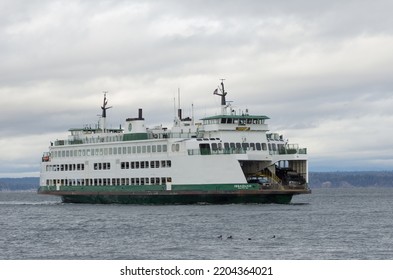 Seattle, Washington, Uninited States - January 17, 2016: Ferry Boat Shown Leaving.