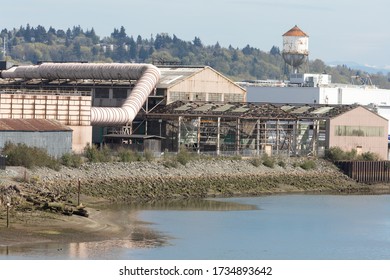 Seattle, Washington / USA - April 14 2020: Old Industrial Warehouse Along The Duwamish River