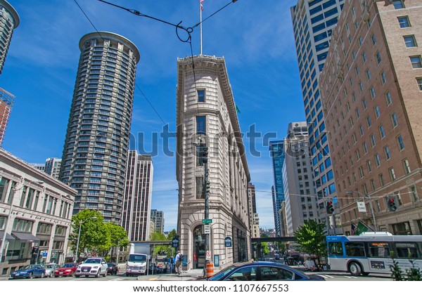 SEATTLE, WASHINGTON, USA -\
APRIL 15,2015 : Beautiful architecture of old building and blue sky\
in downtown Seattle,This is a famous place in Seattle ,Washington\
state USA.