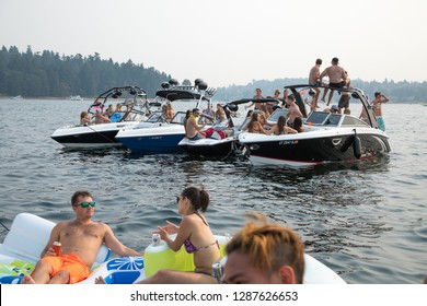 Seattle, Washington / USA - August 6 2017: Boaters Partying On Luxury Speed Boats In Lake Washington During Seafair Weekend