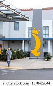 Seattle, Washington / USA - December 2 2019:  Customer Walking Towards A Quality Food Centers (QFC) A Kroger Owned Grocery Market Chain, At University Village