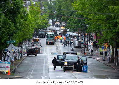 Seattle, Washington / USA - July 1 2020: Seattle Police And Department Of Transportation Workers Clearing The Capitol Hill Occupation Protest (CHOP)