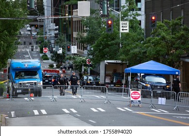 Seattle, Washington / USA - June 10 2020: Officers At A Blockade On 9th In Front Of The Seattle Police Department West Precinct