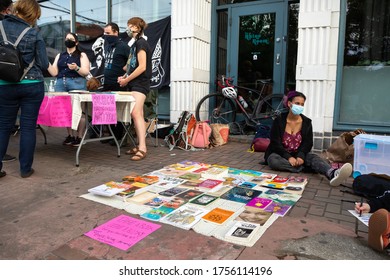 Seattle, Washington / USA - June 10 2020: Community Book Co-op On A Sidewalk In The Capitol Hill Autonomous Zone (CHAZ)