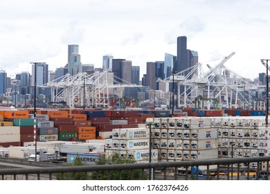 Seattle, Washington / USA - May 21 2020: Shipping Containers At The Port Of Seattle, With The City Skyline In The Distance