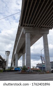 Seattle, Washington / USA - May 21 2020: Warehouse Parking Lot Under The West Seattle Bridge