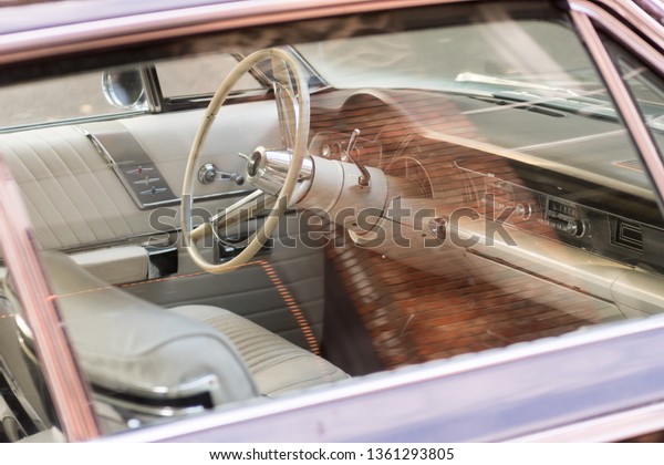 Seattle, Washington, USA - October 18, 2019:\
Interior of a Chrysler classic car in a street next to Occidental\
Square in Seattle
