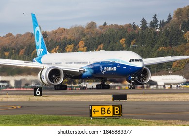 SEATTLE, WASHINGTON / USA - October 30, 2020: A Boeing 777X arrives at Boeing Field.
