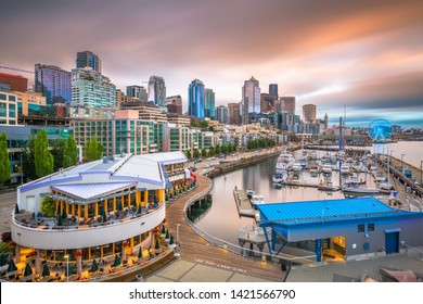 Seattle, Washington, USA pier and skyline at dusk. 
