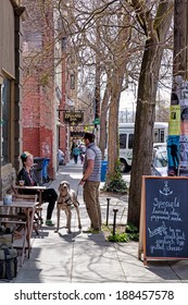 SEATTLE-APR 15, 2014: Coffee Drinkers At A Sidewalk Cafe In Ballard, A Popular Seattle Neighborhood Known For Its Historic Architecture And A Growing Scene Of Hip Restaurants, Bars And Shops.