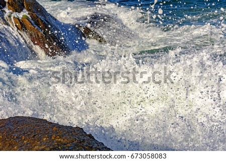 Similar – waves and splashes of sea surf and stones on the seashore in Egypt Dahab South Sinai