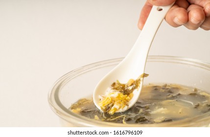 Seaweed Egg Flower Soup In Glass Bowl On Pure White Background