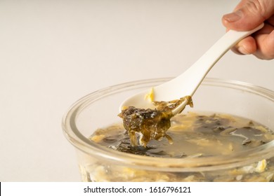 Seaweed Egg Flower Soup In Glass Bowl On Pure White Background