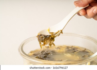 Seaweed Egg Flower Soup In Glass Bowl On Pure White Background