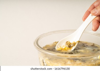 Seaweed Egg Flower Soup In Glass Bowl On Pure White Background