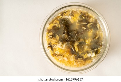 Seaweed Egg Flower Soup In Glass Bowl On Pure White Background