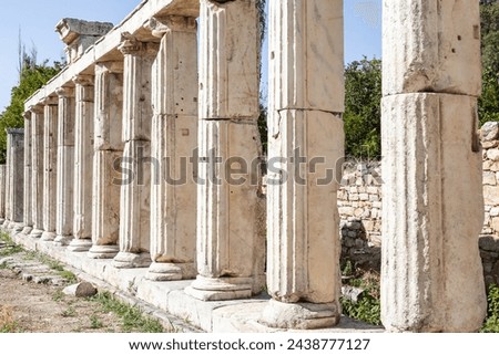 Sebasteion colonnade, Aphrodisias, marble columns, entablature, clear sky, sunlight and shadows. Geyre, Aydin, Turkey (Turkiye)
