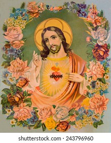 SEBECHLEBY, SLOVAKIA - JANUARY 6, 2015: Typical Catholic Image Of Heart Of Jesus Christ In Flowers (in My Own Home) From Slovakia Printed In Germany From End Of 19. Cent. Originally By Unknown Artist.