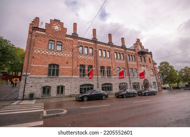 Sec T Organization Flags On The Brick Building Münchenbryggeriet Event And Conference A Cloudy Autumn Day In Stockholm, Sweden 2022-09-17