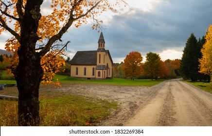 Secluded Church In Rural Northeast United States Along A Dirt Road With No People Around In Autumn And Beautiful Fall Colors 