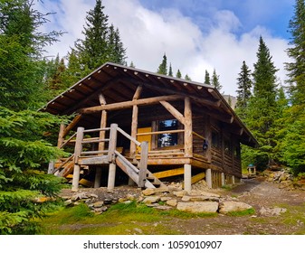 A Secluded Log Cabin In The Woods