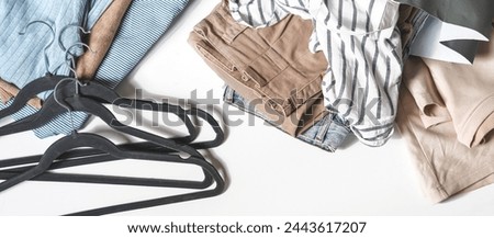 Second hand clothes, used wardrobe. Circular fashion, fast fashion, eco-friendly sustainable shopping, clothing recycling, top view,eco friendly, retail,no waste