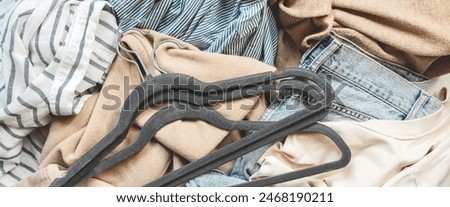 Second hand clothes, used wardrobe. Circular fashion, fast fashion, eco-friendly sustainable shopping, clothing recycling, top view,eco friendly, retail,no waste