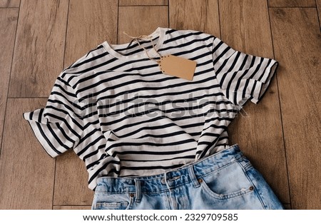 Second hand wardrobe idea. eco friendly sustainable shopping, thrifting shop concept. Top view over woman outfit