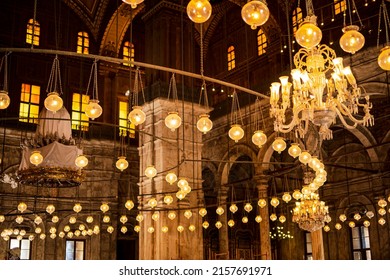 Second shot of the illuminated interior with countless lanterns inside the Alabaster Mosque. Photograph taken in Cairo, Egypt. - Shutterstock ID 2157691971