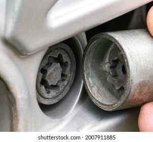 A secret bolt in car wheel  Anti  theft protection  macro