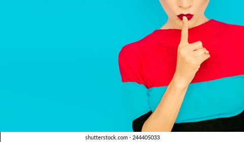 Secret Girl On Blue Background. Red Lips Trend