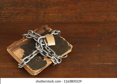 Secret Knowledge Hidden In The Locked With Chain Book
