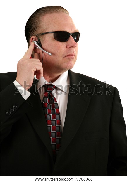 Secret Service Agent Talks Into His Stock Photo (Edit Now) 9908068