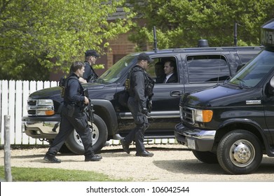 Secret Service Agents And Black Government SUV's In Williamsburg Virginia On May 4, 2007 In Anticipation Of The Arrival Of Her Majesty Queen Elizabeth II And Vice President Dick Cheney