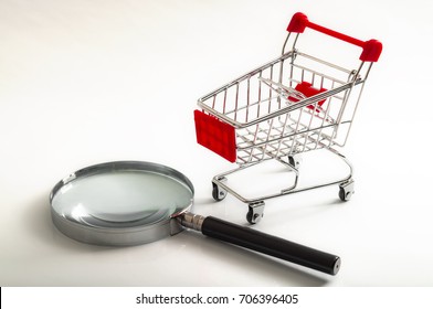 Secret Shopper Or Mystery Shopper Concept With A Magnifying Glass And A Shopping Basket Or Trolley Isolated On A White Background And Copy Space