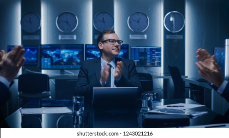 Secretary Delivers Good News To A Board Of Directors Meeting, Everybody Present Applaud. Serious Business People Have Successful Day On The Stock Market.