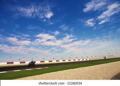 Section Of Astro Turf And Asphalt Next To The Lusail GP And Race Track. Main Straight Grandstand And Pavilion